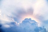 Fototapeta Promień słońca po chmurach.