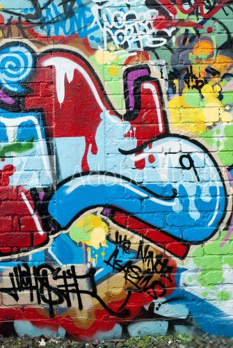Fototapeta Abstrakcjonistyczni graffiti na textured ściana z cegieł
