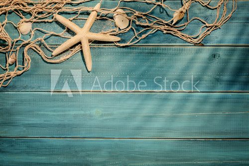 Fototapeta Morski rytm plaży i sieci rybackiej