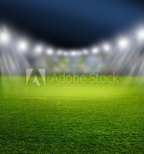 Fototapeta Nocny mecz na stadionie z oświetleniem