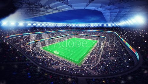 Fototapeta oświetlony stadion piłkarski z kibicami na trybunach