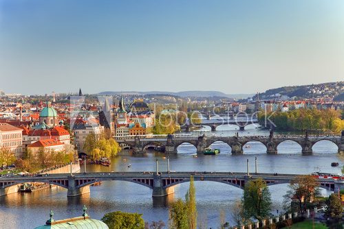 Fototapeta Widok na mosty w Pradze o zachodzie słońca