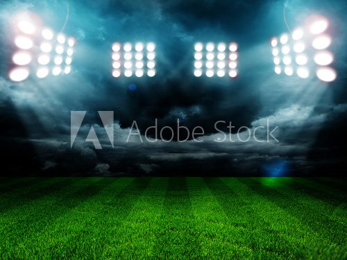 Fototapeta Wieczorny blask na stadionowej murawie