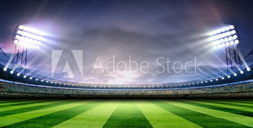 Fototapeta Wieczorny blask stadionu z trybunami