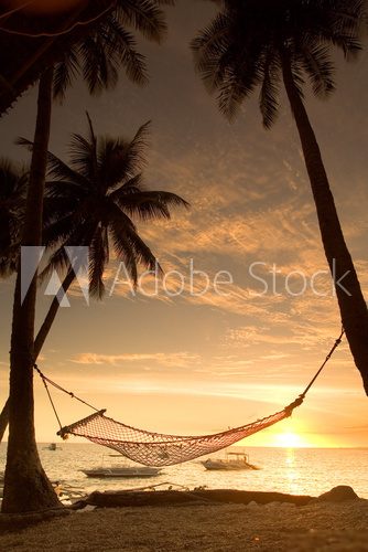 Obraz Relaksujący zachód słońca hamaku