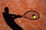 Fototapeta cień tenisisty w akcji na korcie tenisowym