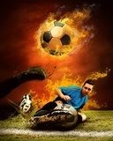 Fototapeta Gracz futbolu w ogieniu płonie na outdoors polu