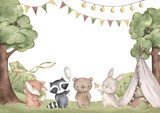 Fototapeta Leśni przyjaciele. Akwarelowa, ręcznie rysowana ramka z leśnymi zwierzętami na polanie, dziecięcą chatką, drzewem, krzewami i flagami. Szablon karty na baby shower, urodziny, do pokoju dziecięcego.