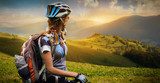 Fototapeta Młoda kobieta z rowerową pozycją w górach
