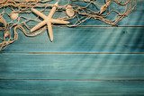 Fototapeta Morski rytm plaży i sieci rybackiej