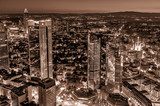 Fototapeta Nocna panorama biznesowego miasta w sepii