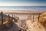 Fototapeta ścieżka piasku do Morza Północnego o zachodzie słońca