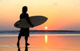 Fototapeta Surfer na zachód słońca