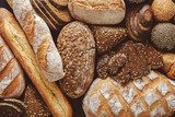 Obraz Chleb tła, widok z góry bochenków biały, czarny i żytni