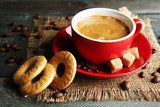 Obraz Filiżanka kawy i smaczne ciasteczka