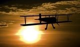 Obraz Samolot i zachód słońca