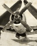 Obraz Wojenny granatowy samolot ze złożonymi skrzydłami